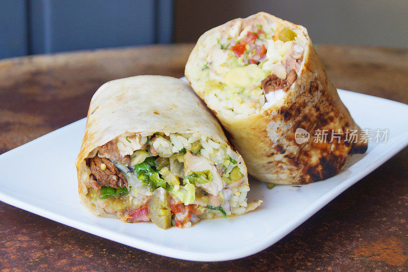 A burrito is a dish of Mexican and Tex-Mex cuisine that was formed in Ciudad Juárez and consists of a flour tortilla wrapped in a sealed cylindrical shape around various ingredients.